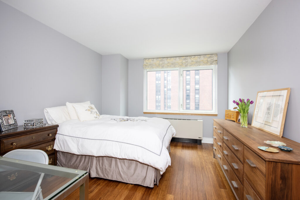 Bedroom in 1760 Second Ave #9E home, showcasing The Zweben Team's expertise in NYC real estate.