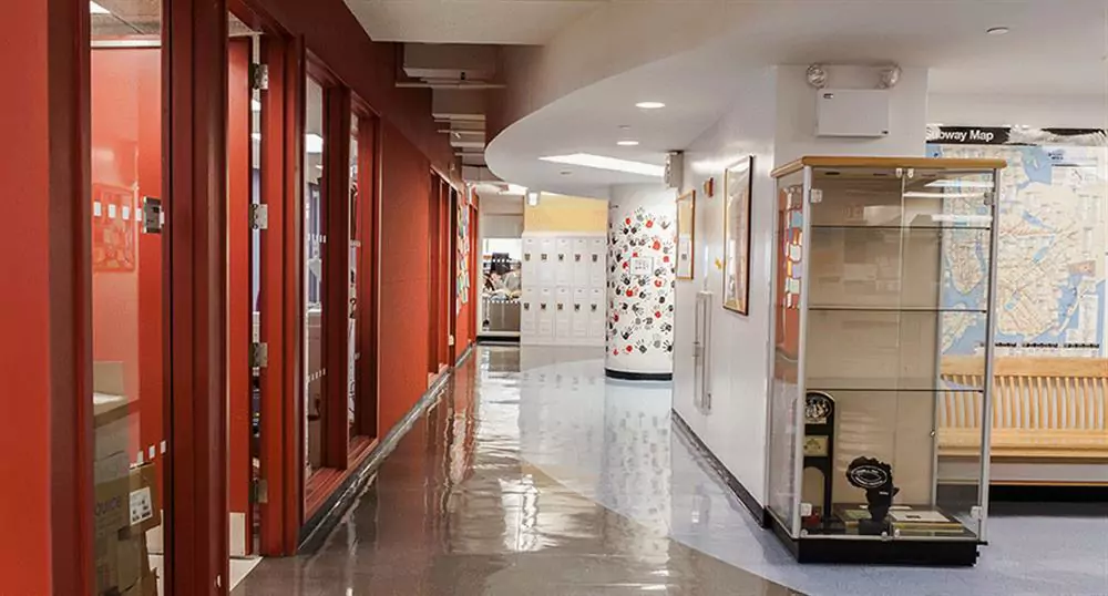 Millennium High School Hall View with White Floors and Bright Colors