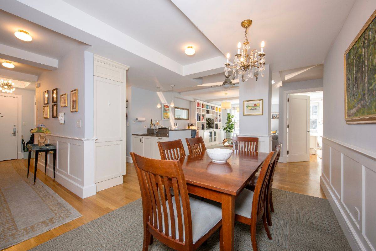 Dining room with a wooden table and chairs on Zweben Team-Top Upper West Side Realtor-27 West 72nd St #505